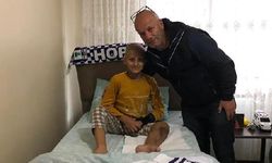 Tedavi için Küba`ya gidecek Osman Can`a Hopasporlu futbolculardan moral